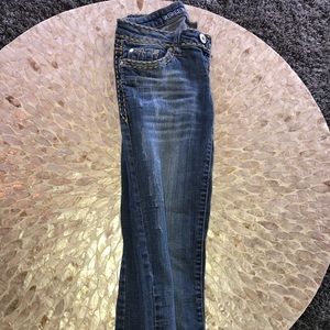 Dark jeans with star pockets